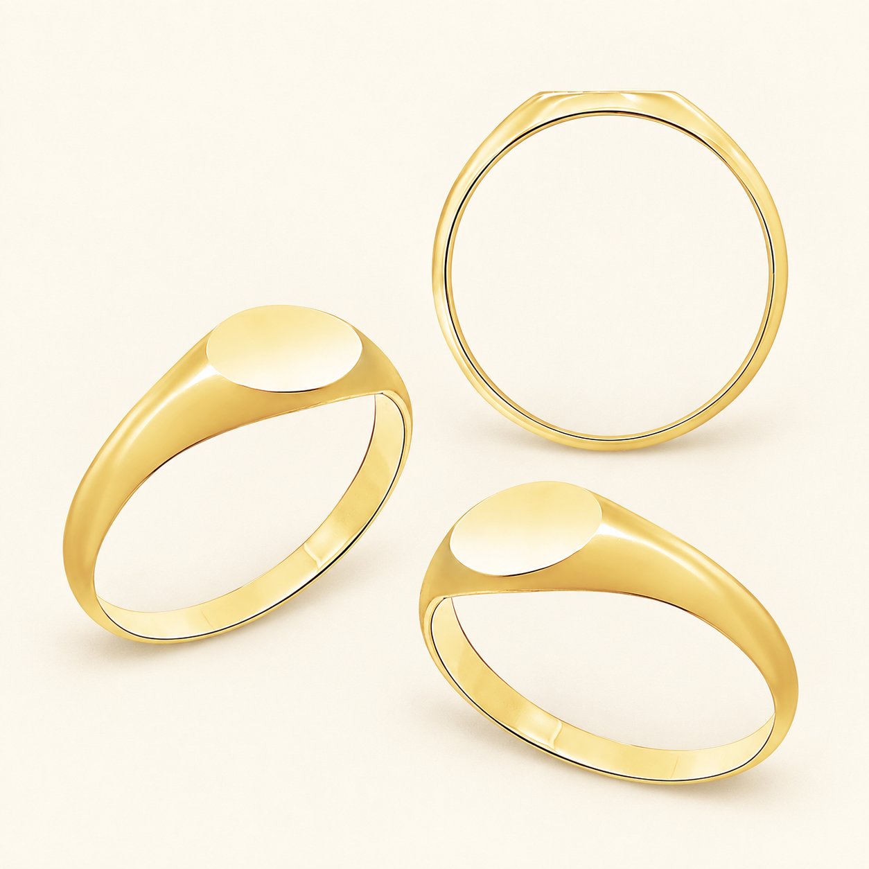 Yellow gold oval signet ring, three views